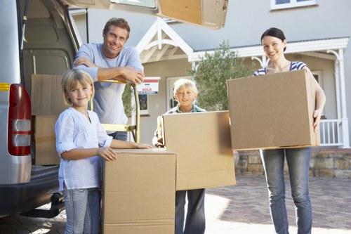 Packing boxes and furniture for transport with a man and van service