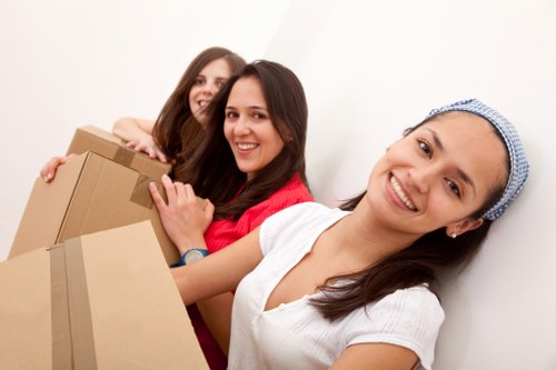 Packed office equipment and furniture ready for transport