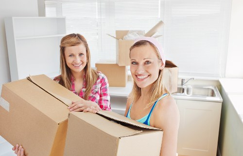 Packed boxes and furniture prepared for removal van transport