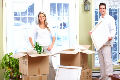 Professional movers loading household items for an Elmersend relocation